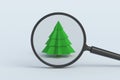 ÃÂ¡hristmas tree behind magnifying glass